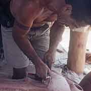 Woodcarver making paoa